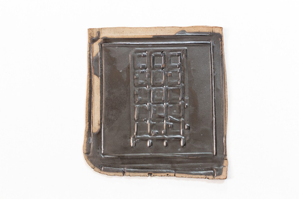 A wall-mounted ceramic from Scaffolds: Ceramic, 2026, by Matt King. Ceramic.