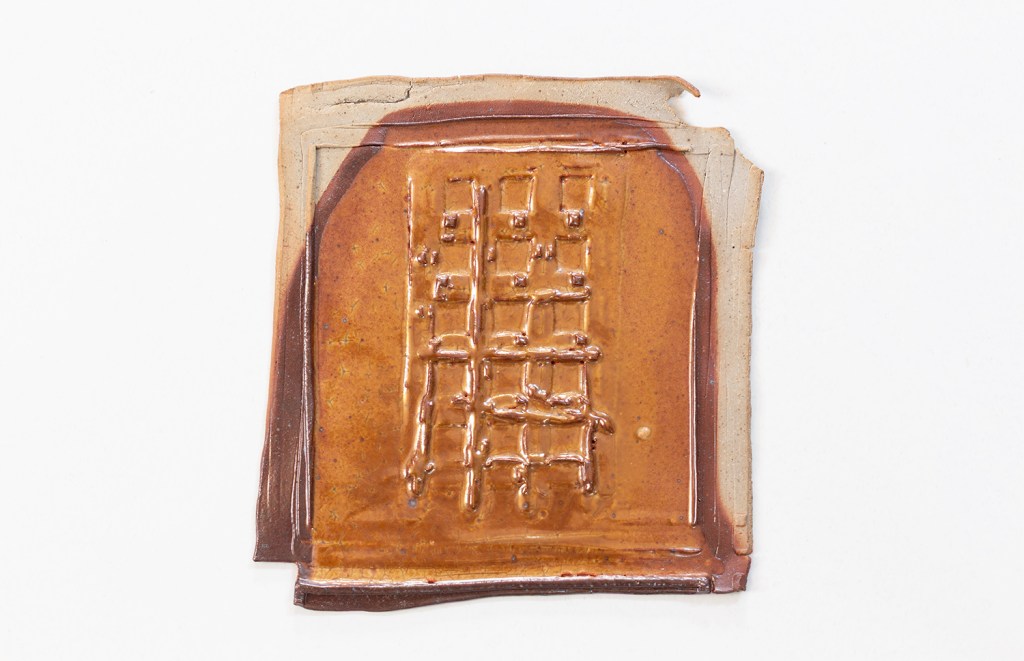 A wall-mounted ceramic from Scaffolds: Ceramic, 2026, by Matt King. Ceramic.